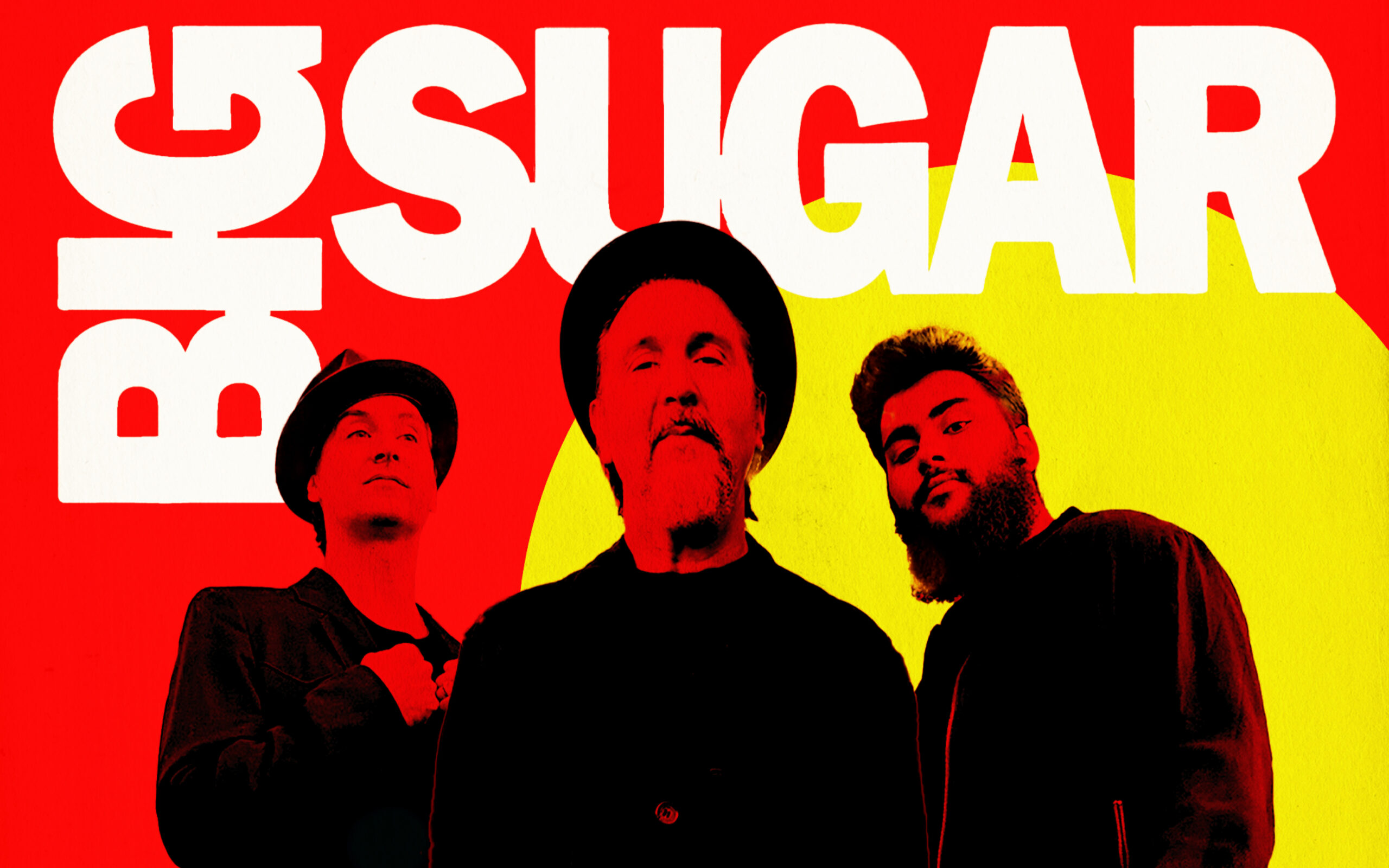 Big Sugar band with a red and yellow background.