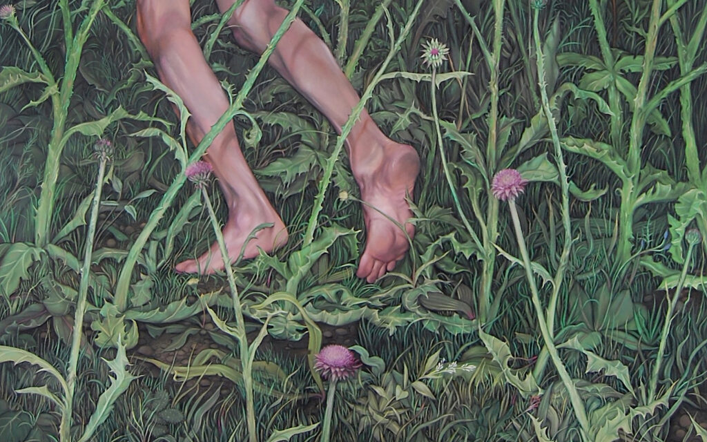 Cultivation Blues exhibit promo with a persons legs laying in a grassy area with flowers blooming.